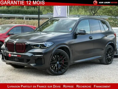 BMW X5 IV (G05) xDrive45eA 394ch - Black Vermilion