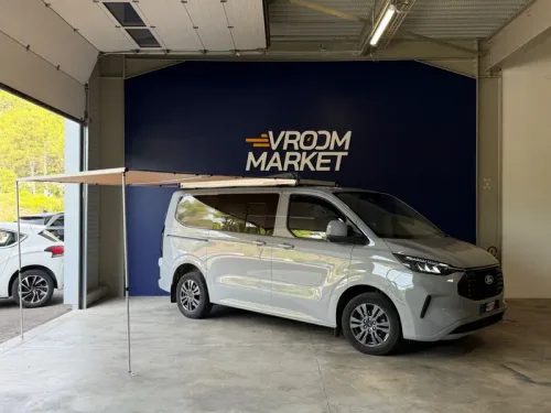 FORD Transit Custom 2.0 TDCI 136 CV LIMITED - ENTRETIEN COMPLET FORD - PANNEAUX SOLAIRES - BARRES DE TOIT - AUVENT - SIÈGES CHAUFFANTS - LIT PEIGNE - CLIMATISATION AUTO - VMC